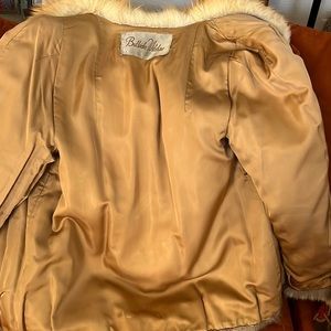 Natural red fox jacket. valued $4700 woman size 4-6 and for a junior size 8-10